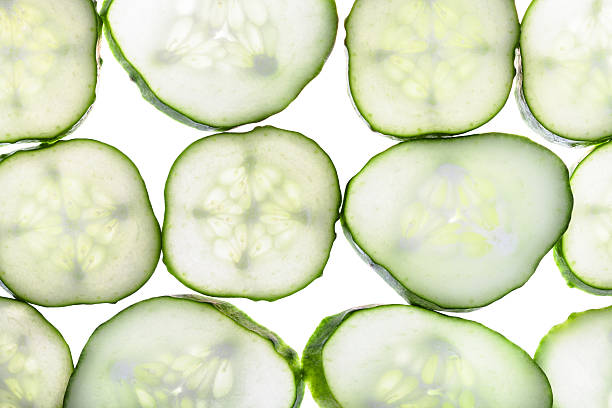 istock rows from slices of fresh cucumber isolated 498016628