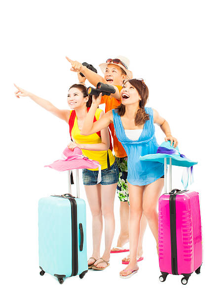 istock happily young backpackers raise hands to point the direction 498016873