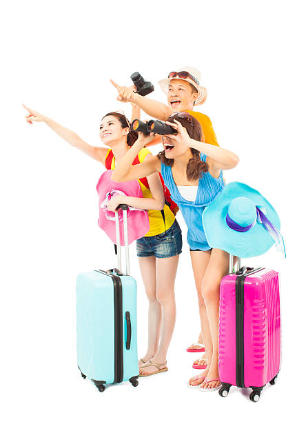 istock happily young backpackers raise hands to point the direction 498017049