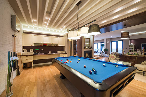 istock Interior of a luxury living room with pool table 498017104