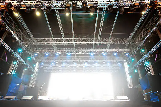 empty rock stage with colorful light show ,copy space