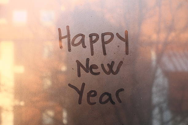 istock Happy New Year text written on the glass 498017918