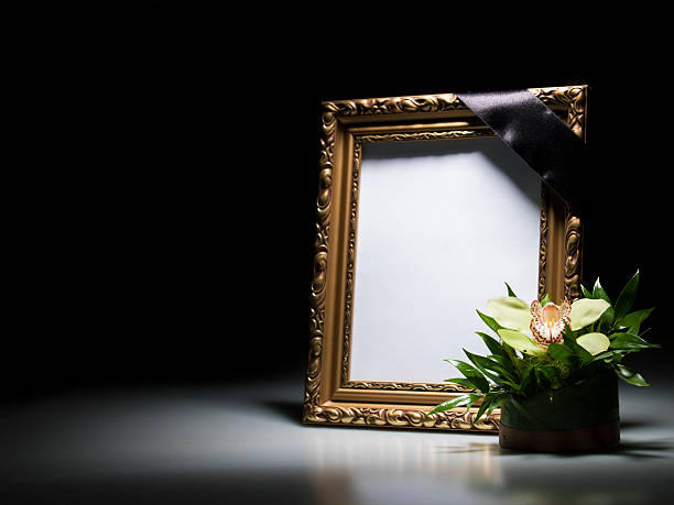 Blank mourning frame for sympathy card Blank mourning frame for sympathy card on dark background funeral photos stock pictures, royalty-free photos & images