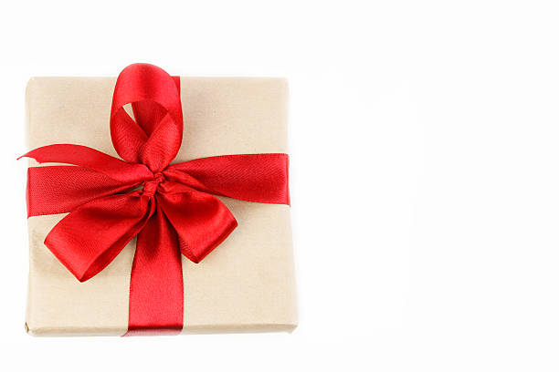 istock Gift with red ribbon top view on white background 498019630