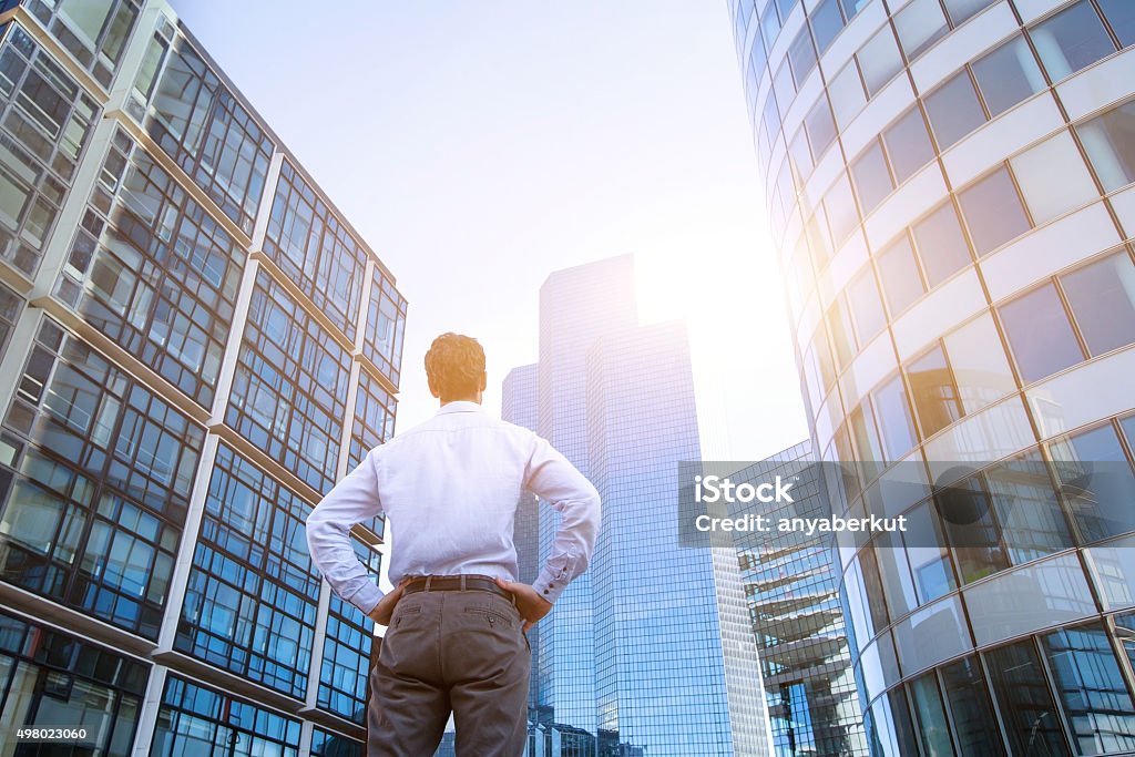career or new opportunity concept, business background career concept, business background, man looking at office buildings Building Exterior Stock Photo