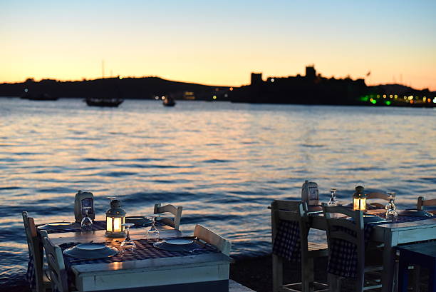 istock Romantic dinner near the sea after sunset time 498025938