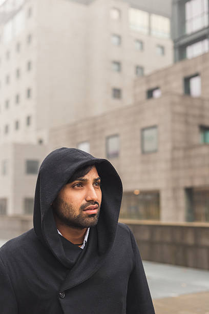 istock Handsome Indian man posing in an urban context 498025992