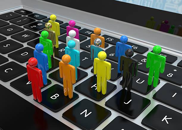 istock group of people figures on laptop, 3d render 498026672