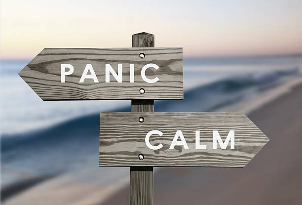 Calm vs Panic Calm vs Panic signs with blurred beach background terrified stock pictures, royalty-free photos & images