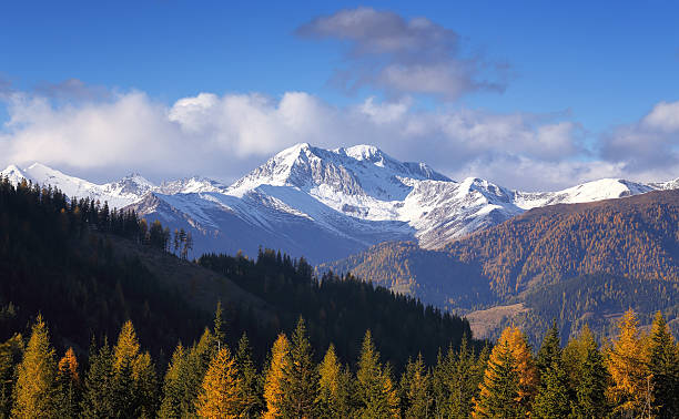 istock Autumn evening view of snow-capped mountains 498026992