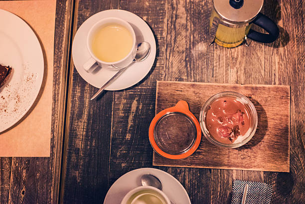 istock wooden table with a cup of tea 498027712