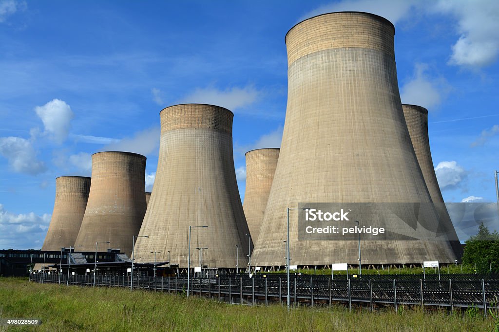 Power Station Cooling Towers Cooling towers of a coal fired power station photographed on a summer day Air Pollution Stock Photo