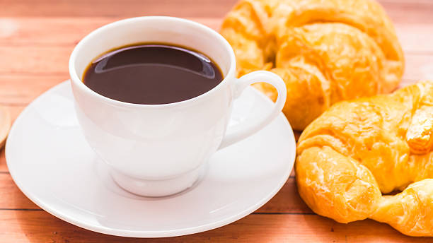 istock Bagels with sesame seeds and black coffee. 498030475
