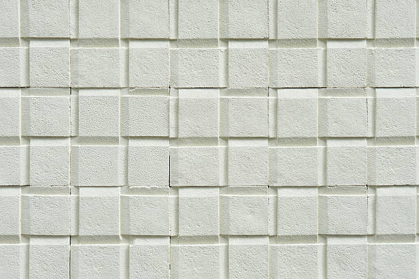 istock Stone wall from pieces in white color 498030481