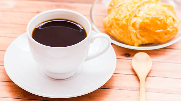 istock Bagels with sesame seeds and black coffee. 498030493