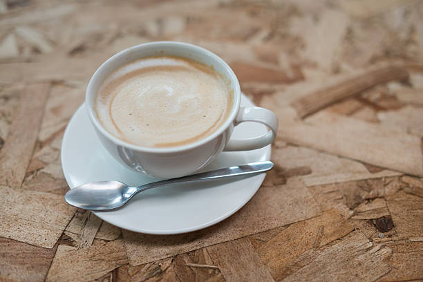 istock hot latte coffee on plywood 498031921