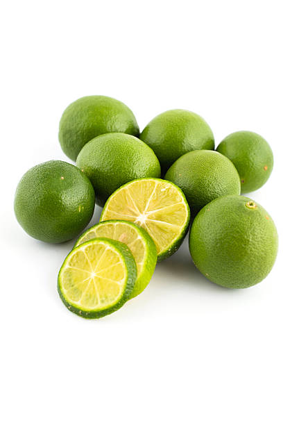 istock green lemon and slice isolated on white 498032535