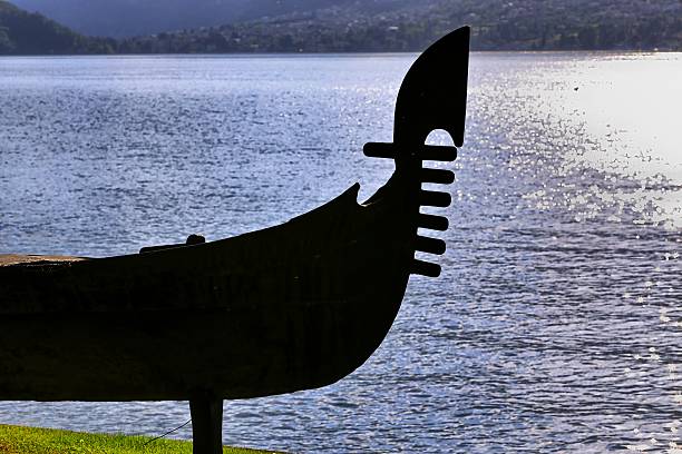 Contour of boat on the lakefront stock photo