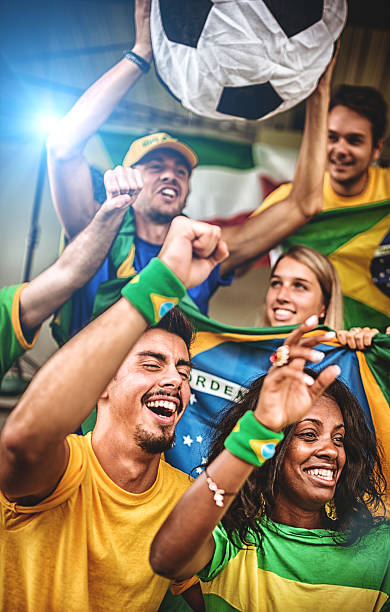 istock Group of brazilian supporters at stadium 498033887