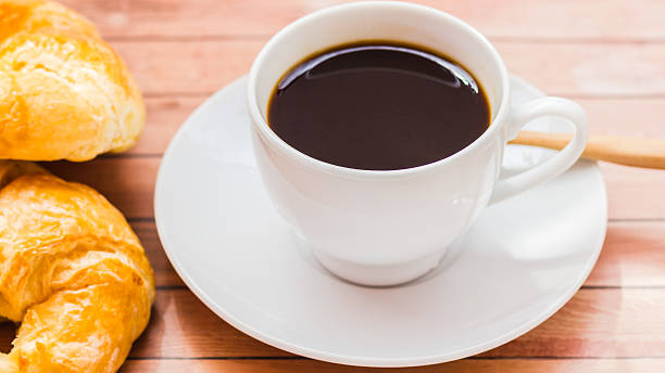 istock Bagels with sesame seeds and black coffee. 498046039