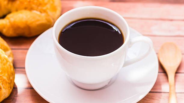 istock Bagels with sesame seeds and black coffee. 498046047