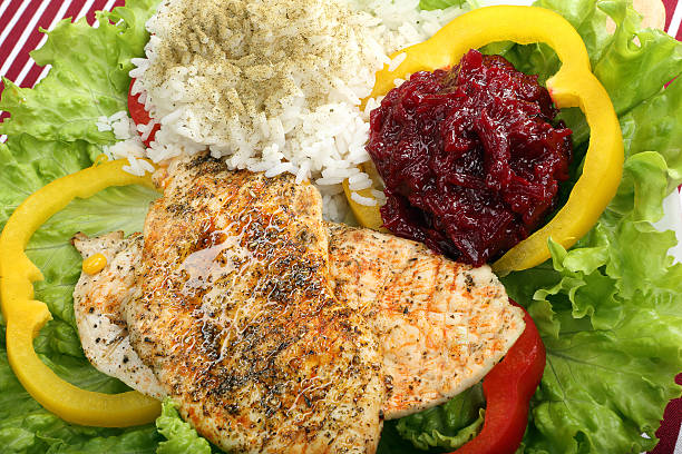 Chicken grilled fillet in herbs with vegetable and rice