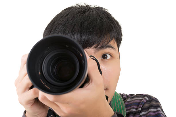 istock Young amateur photographer 498047533