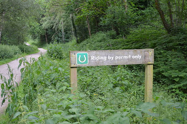 istock Horse riding by permit only sign. 498047747