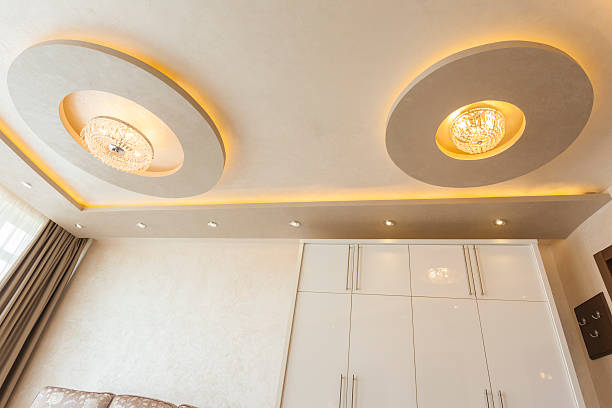 istock Modern lighting on a luxury living room ceiling 498048661