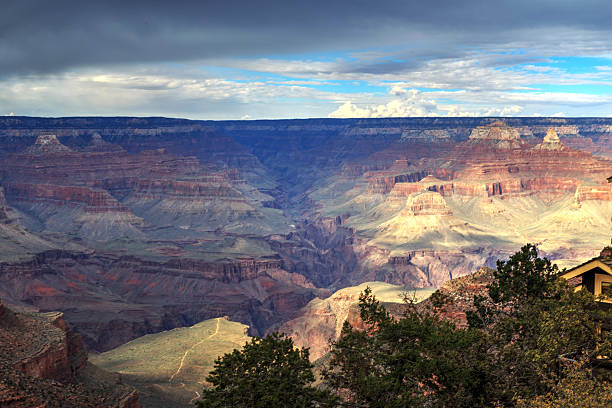 istock Grand Canyon National Park with sunlight breaking through clouds 498049928