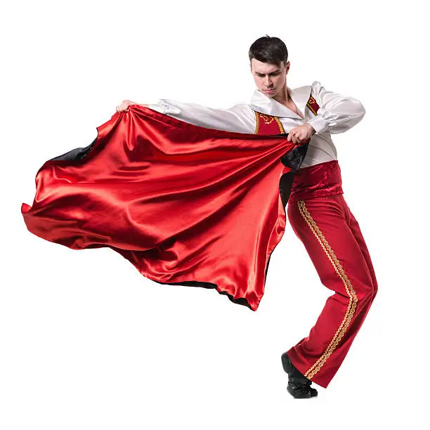 Dancing man wearing a toreador costume. Isolated on white background in full length.