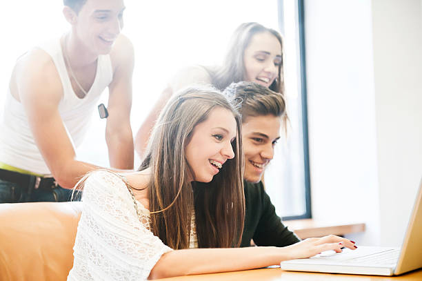 istock Group of young people working  on leptop 498051490