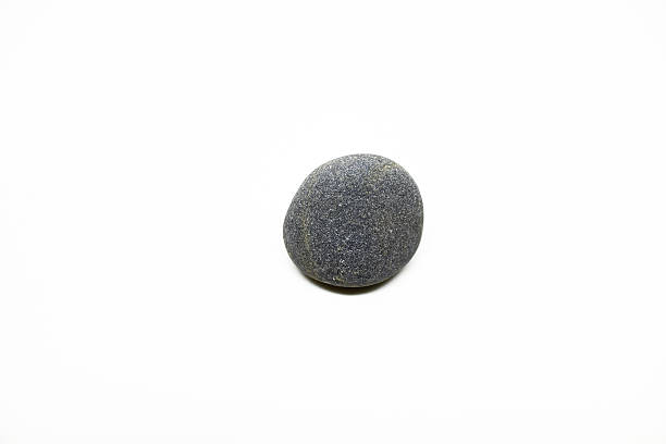 istock Dark grey stone on white background -top view 498053026