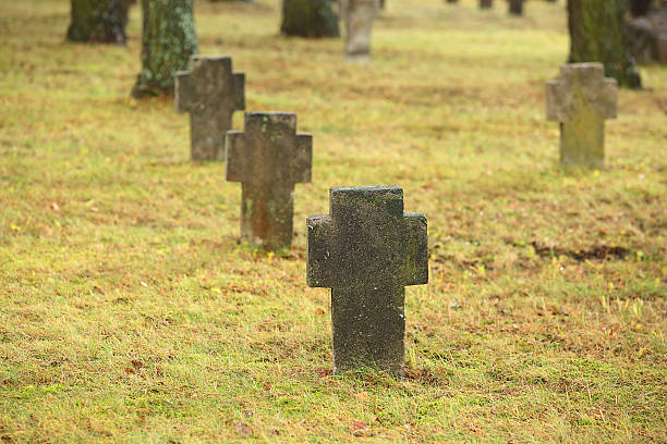 istock Tombstones crosses on old cemetry 498056242