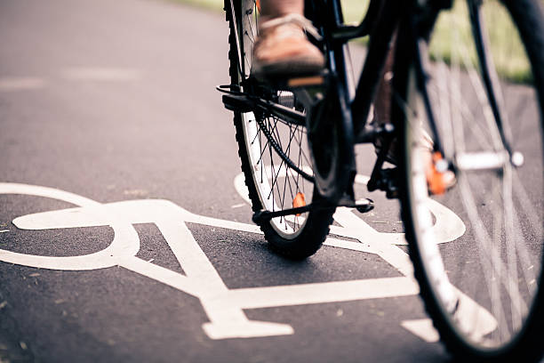City bicycle riding on bike path stock photo