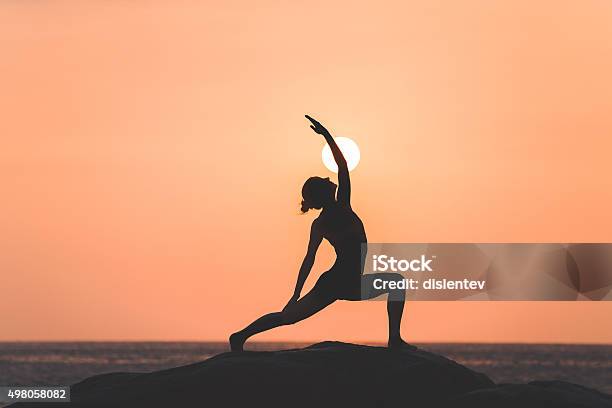 Warrior Pose From Yoga Stock Photo - Download Image Now - Yoga, Beach, Exercising