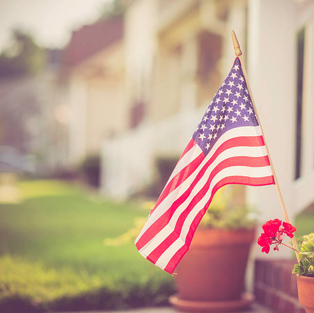 Patriotic Homestead Patriotic Homestead american flag flowers stock pictures, royalty-free photos & images