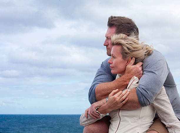 istock Mature couple embracing 498062422