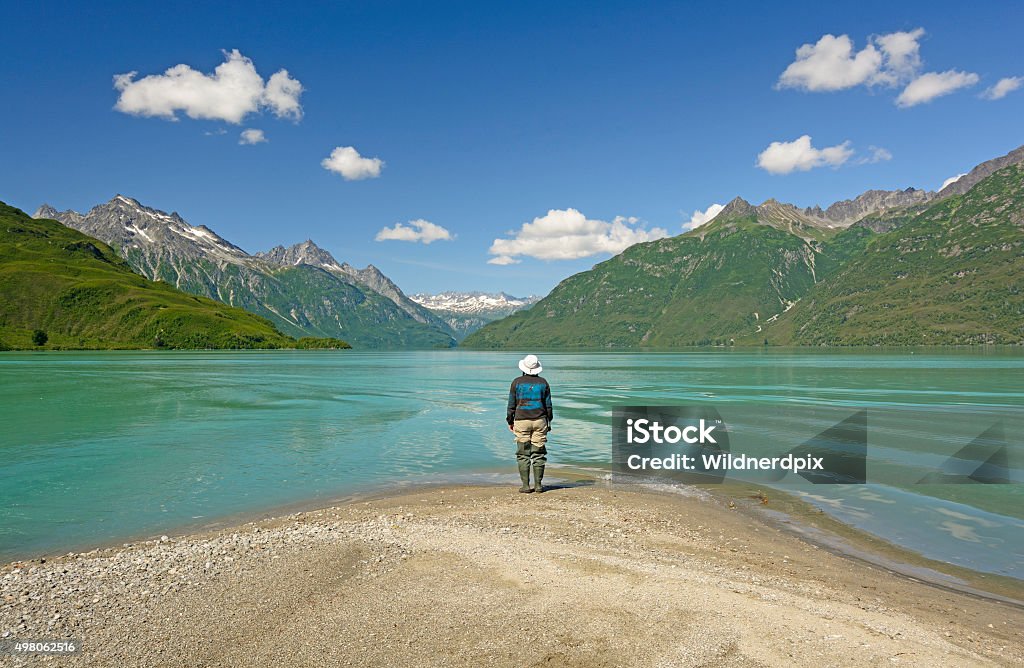 Enjoying a Spectacular View Enjoying a Spectacular View of Crescent Lake on a Sunny Summer day in Lake Clark National Park in Alaska Alaska - US State Stock Photo
