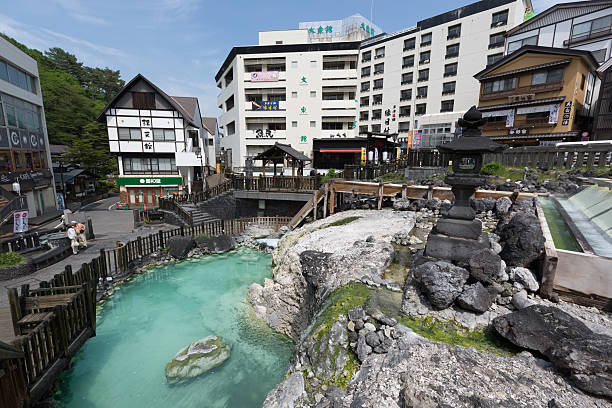 The Yubatake in Kusatsu, Japan The Yubatake is the symbol of Kusatsu and one of the resort's main sources of hot spring water.  gunma prefecture stock pictures, royalty-free photos & images