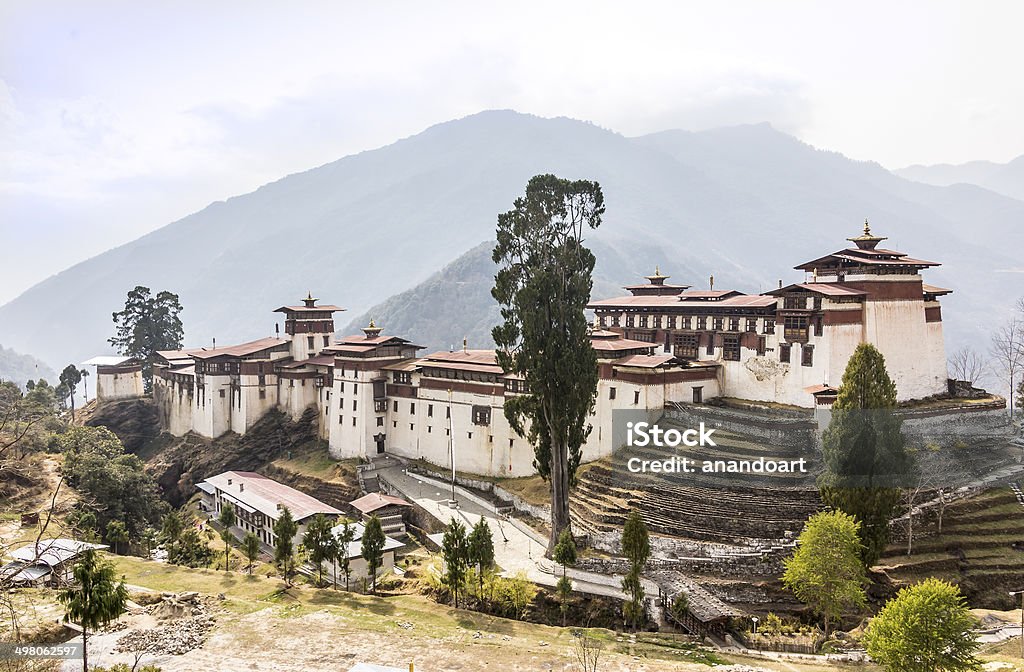 The dzong of Trongsa The beautiful dzong of Trongsa, Bhutan. Dzongs are fortress like buildings that house a monastery and administration offices. Bhutan Stock Photo