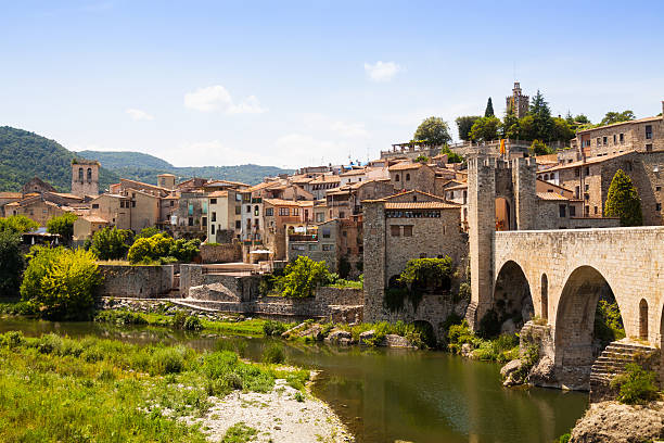 istock Antique medieval town with old gate on bridge 498064605
