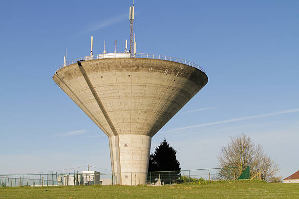 istock Concrete UFO Water Tower with mobile antenna in Belgium 498065455