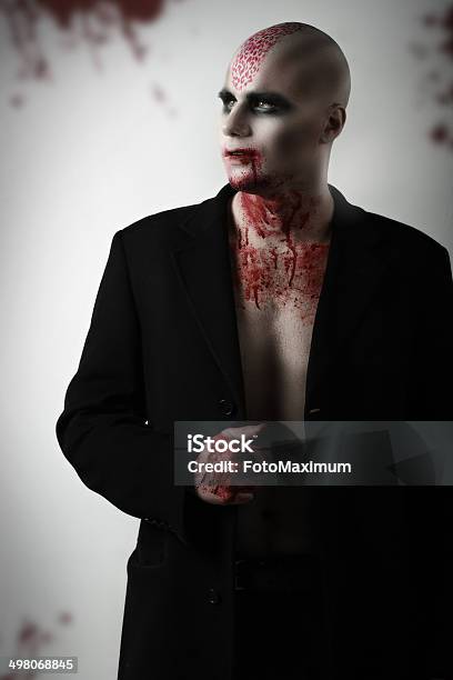 Cannibal Maniac With Blood On Face Stock Photo - Download Image Now - Halloween, Adult, Adults Only