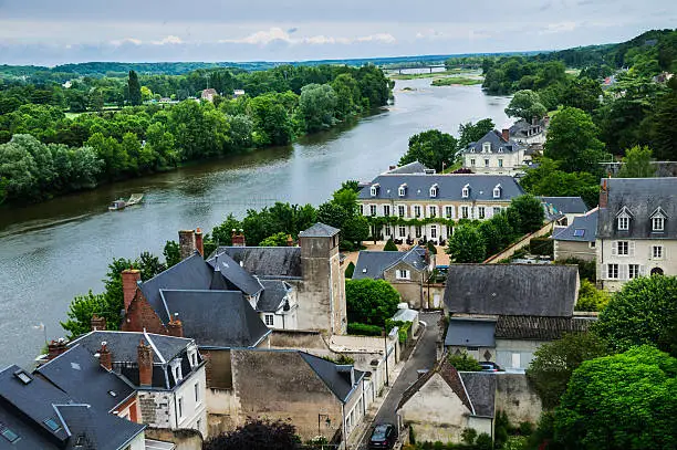 Rising in the Massif Central  upland area in south-central France, the Loire River flows north and west for 634 miles toward Brittany where it empties into the Atlantic Ocean. It is the longest river in France. This section borders the town of Amboise.