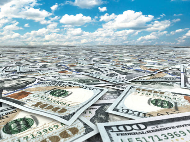 istock Lot of dollar banknotes and sky. 498077199
