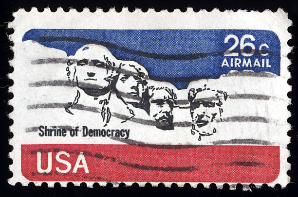 United States Stamps A post stamp printed in USA shows national memorial. Stone Sculptures of George Washington, Thomas Jefferson, Theodore Roosevelt, and Abraham Lincoln, circa 1980's grover cleveland stock pictures, royalty-free photos & images