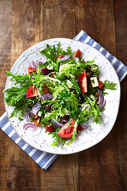 istock Endive Salad with Tomato, Olives and Feta 498077575