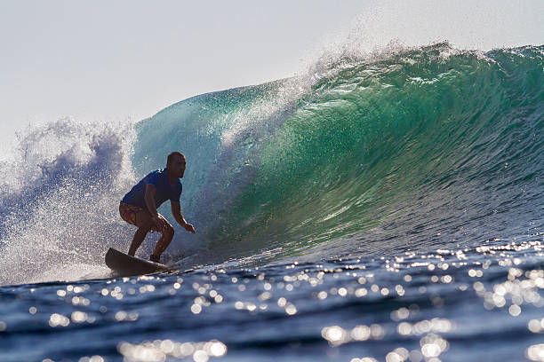 istock Surfing a Wave. Bali Island. Indonesia. 498078267