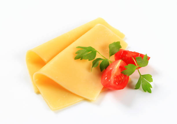 istock Sliced cheese and tomato wedges 498079157